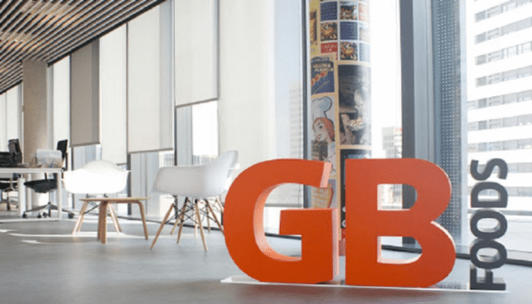 GB Foods logo in modern office lobby