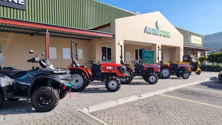 Tractors and ATV outside Agrimark store entrance