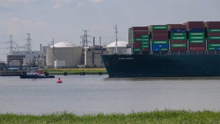 Ever Given container ship near industrial port