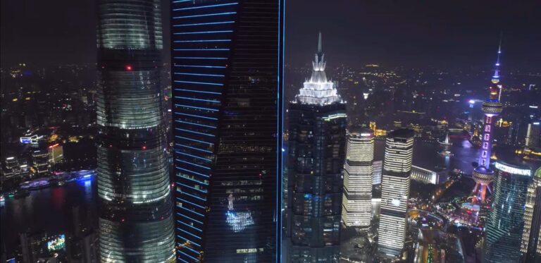 Shanghai skyline at night with illuminated skyscrapers