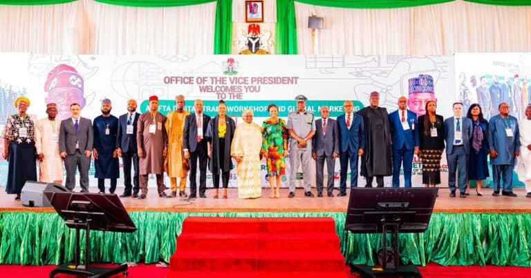 Officials posing at Vice President workshop event